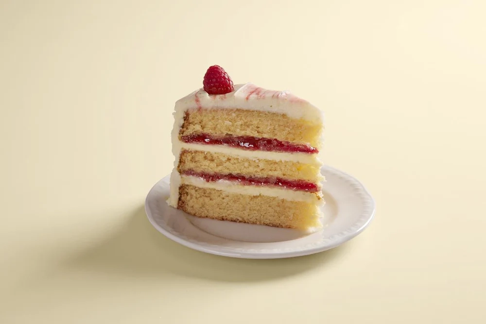 lemon-and-raspberry-ripple-cake-slice-rev0-3-1000x-jpg-643a7161609f3994873703.webp